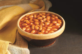 Microwave-safe bowl with Amy's baked beans, easy heat-and-serve