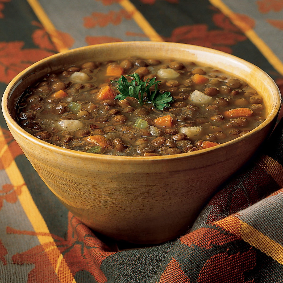 Amy's Organic Lentil Soup cans close-up, vegan and gluten-free pantry staple.