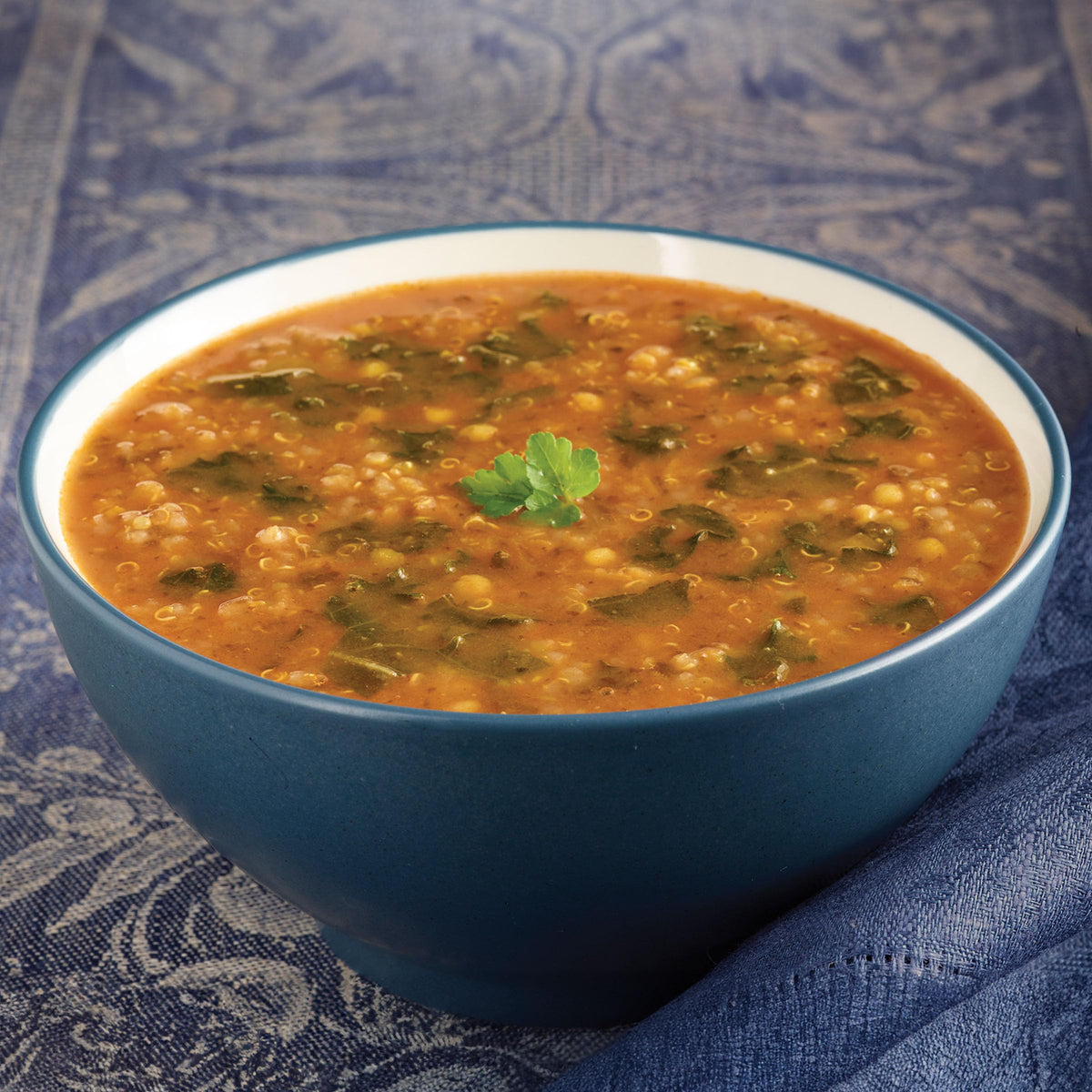 Amy's Soup organic ingredients close-up highlighting kale, quinoa, and red lentils.