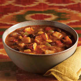 Amy's Tortilla Soup can label close-up showing organic certifications.