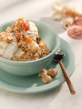 Anahola Granola Tropical paired with milk or yogurt for quick mornings.