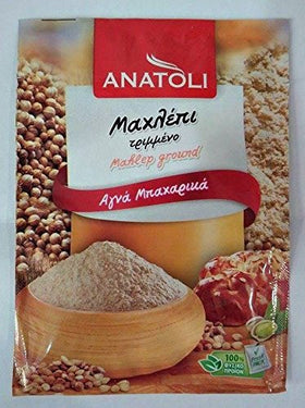 Anatoli mahleb spice in a tin, ready to elevate aromatic desserts.