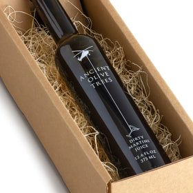 ANCIENT OLIVE TREES olive-brine-bottle-pour shows a clean finish ideal for martinis