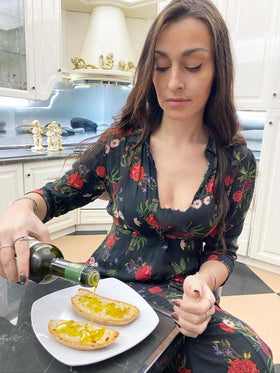 Ancient Foods Keros gourmet-sauce preparation in elegant kitchen.