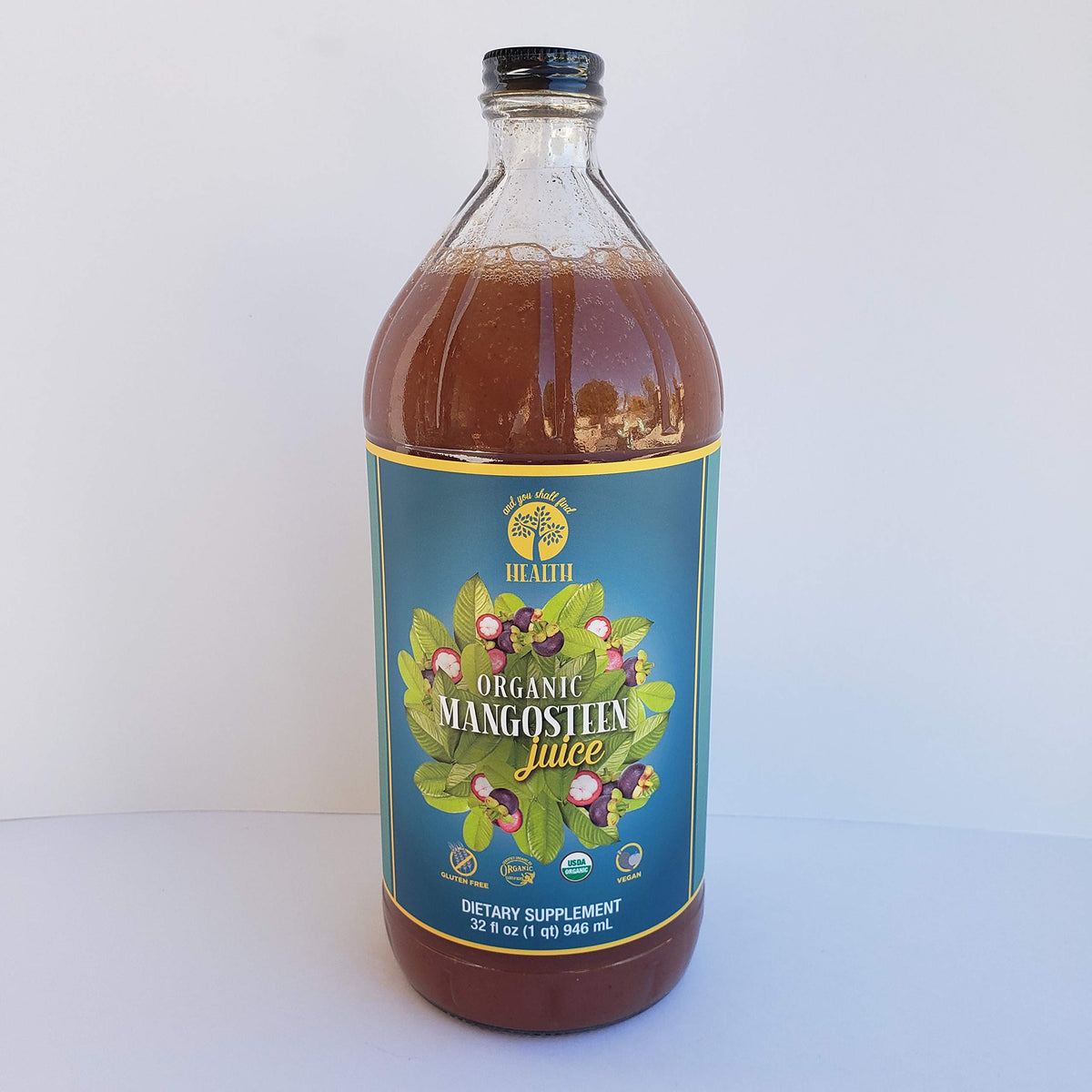 And You Shall Find Health organic mangosteen juice label highlights gluten-free and vegan credentials.