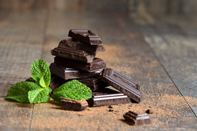 Andes Mints coffee pod on desk, enhancing your afternoon break.