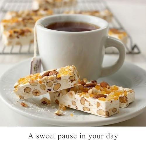 Andy Anand Chocolatier candied orange peel adds bright citrus notes to each bite.