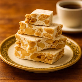 Andy Anand Chocolatier nougat bites with roasted almonds for real crunch.