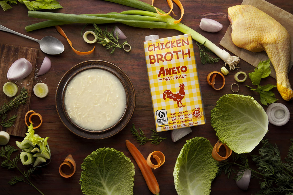 Kitchen scene using Aneto broth as base for soups and braises