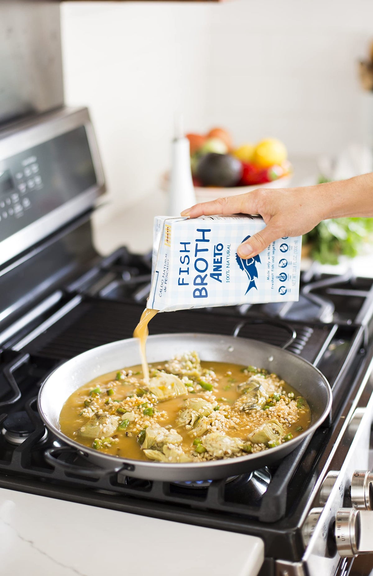 Aneto Fish Broth label detail highlighting 100% natural.