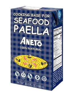 Aneto Seafood Paella Base bottle close-up highlights fresh ingredients for authentic flavor.