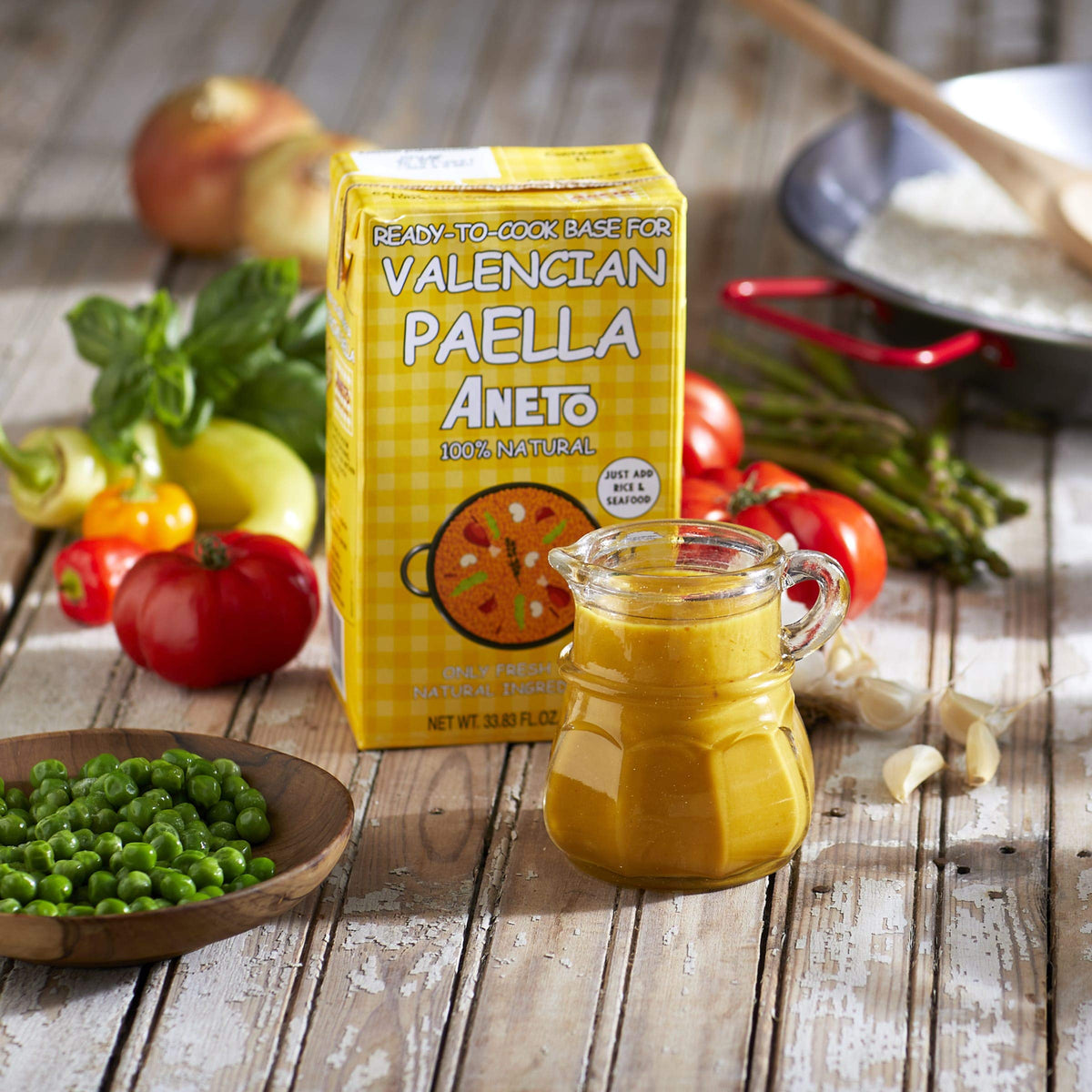 Aneto Valencian paella kitchen scene inviting home cooking