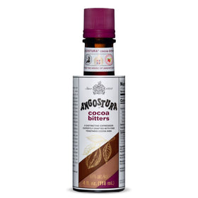 ANGOSTURA Cocoa Bitters bottle on a bar shelf adds cocoa depth to cocktails.