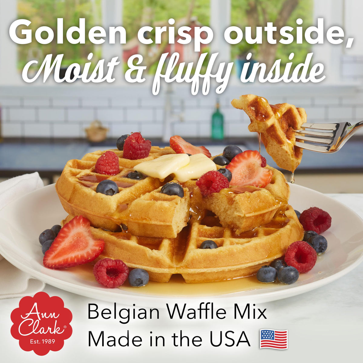 Waffles cooking on a hot griddle from Ann Clark mix.