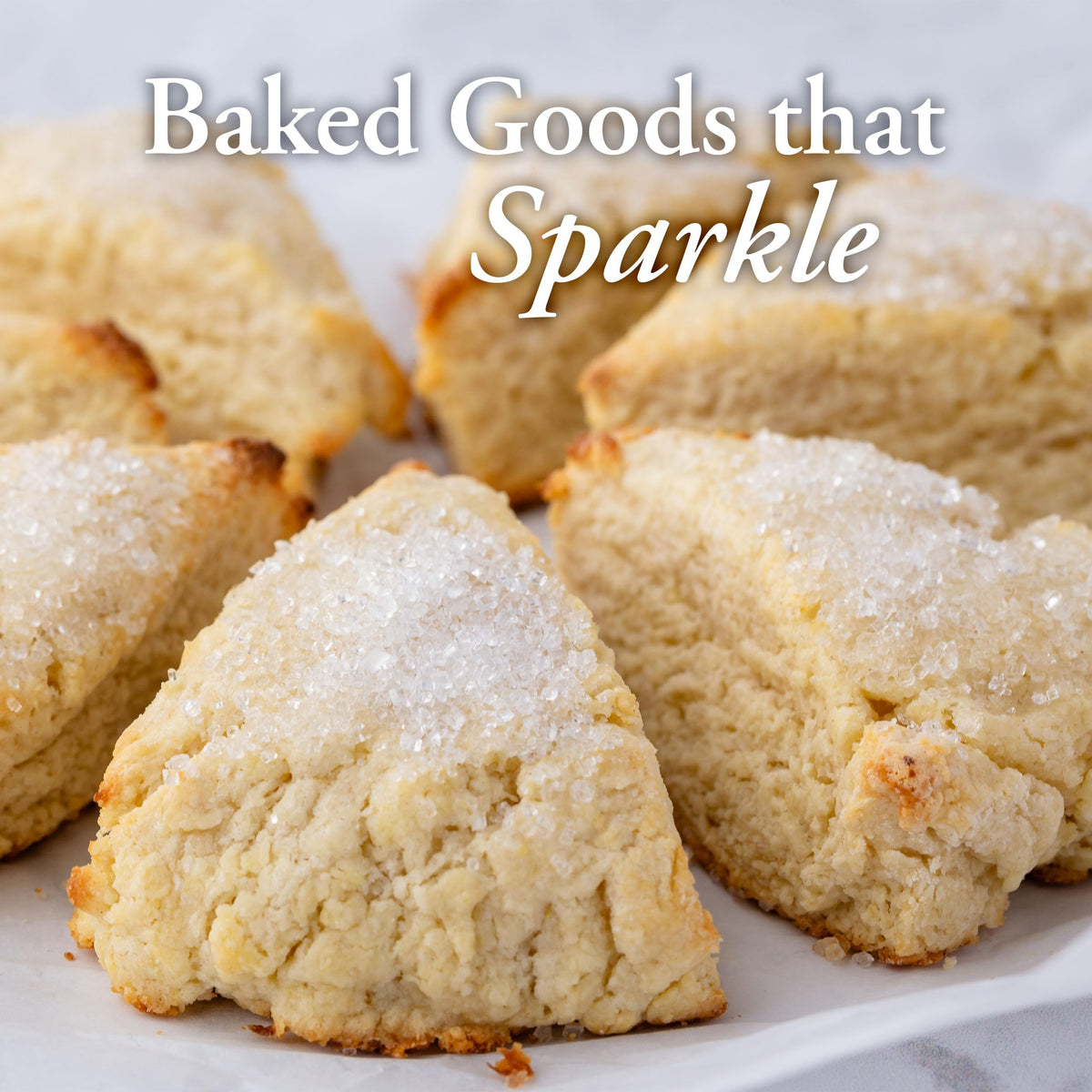 Ann Clark Sparkling Sugar being sprinkled on cookies for a dazzling finish