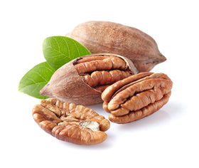 Close-up view of Anna and Sarah pecans in-shell highlighting natural texture.