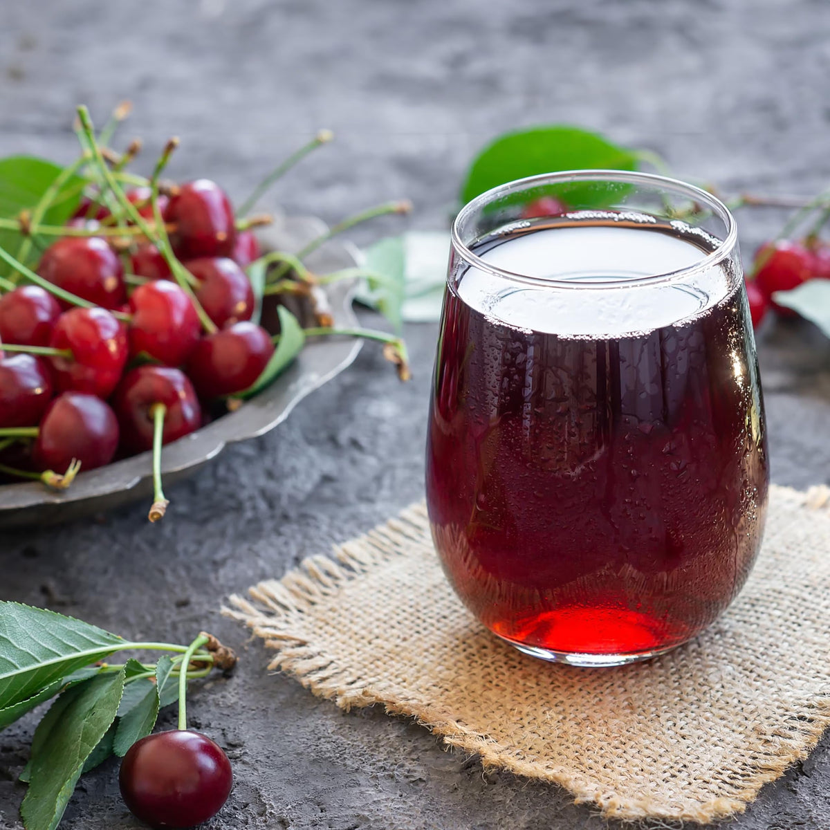 Two-pack glass bottles of Anna and Sarah tart cherry juice for family sharing.