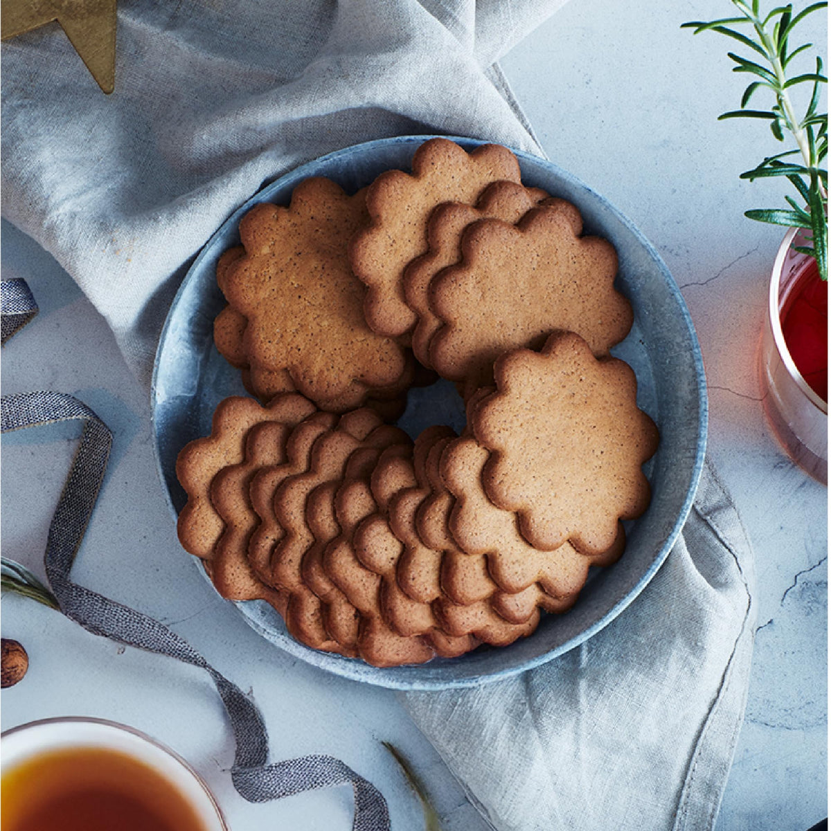 Close-up of Annas Thins Orange Pepparkakor cookies highlighting crisp texture