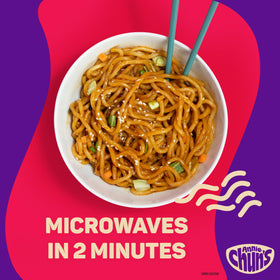 Annie Chun's gochujang sauce drizzle over tender noodles in a bowl.
