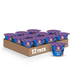 Annie's microwavable mac and cheese cups with shells closeup, ideal for quick, creamy meals.