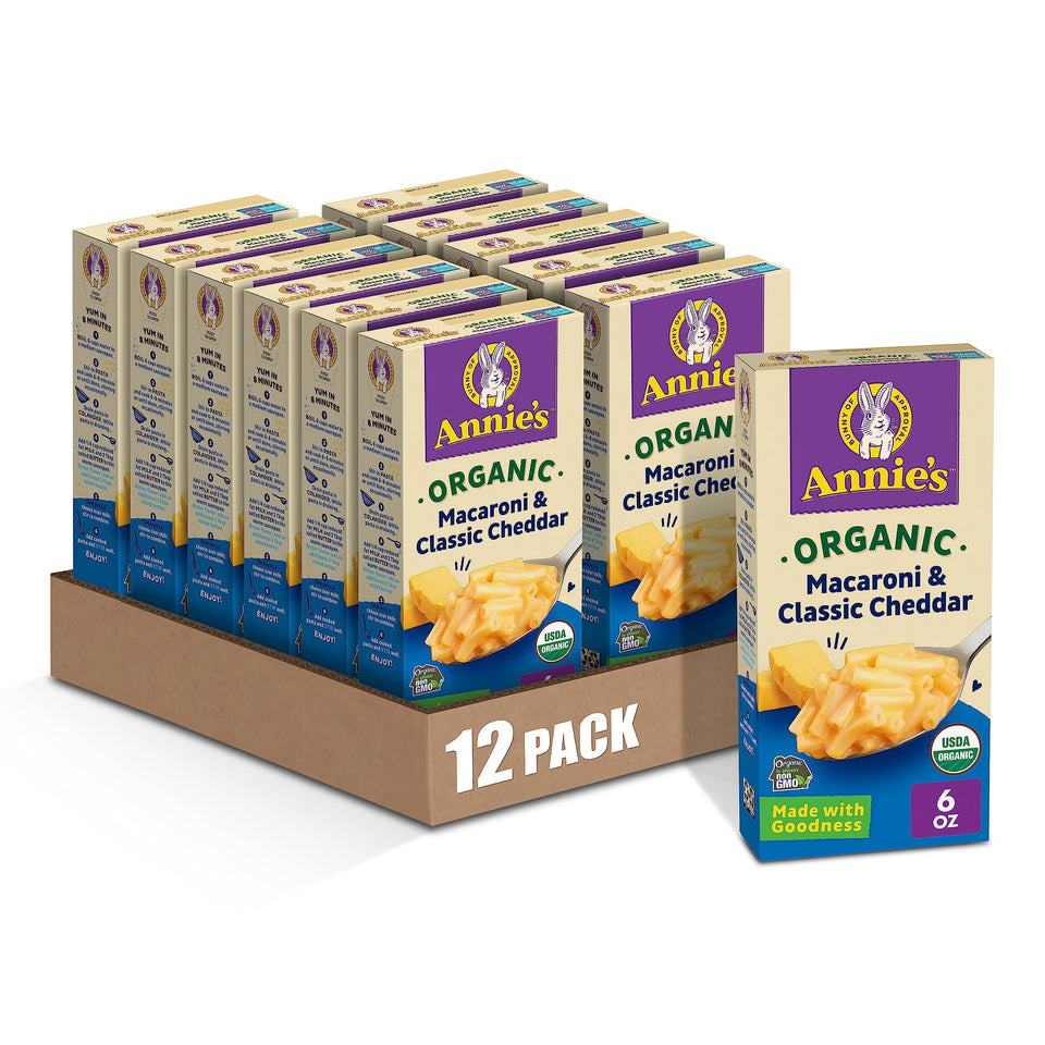 Annie's Organic Macaroni and Classic Cheddar box front, indicating family-friendly convenience.