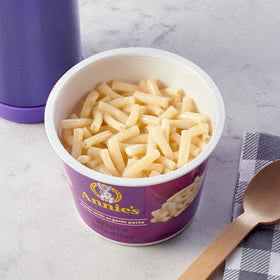 Annie's Organic White Cheddar Mac and Cheese Cup microwave-ready bowl ready to heat