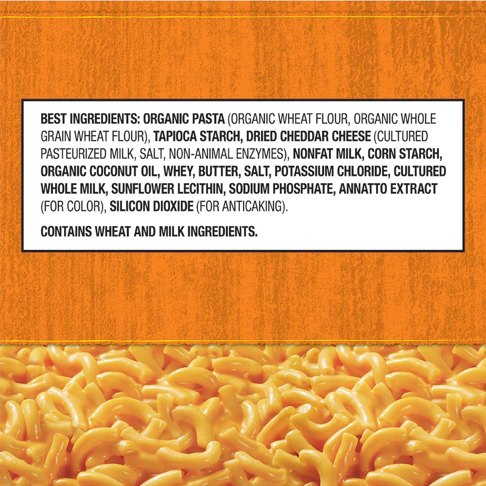 Annie's Real Aged Cheddar Mac Cup cheese packet ready to stir