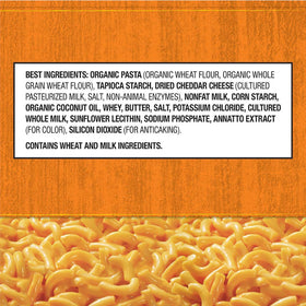 Annie's Real Aged Cheddar Mac Cup cheese packet ready to stir