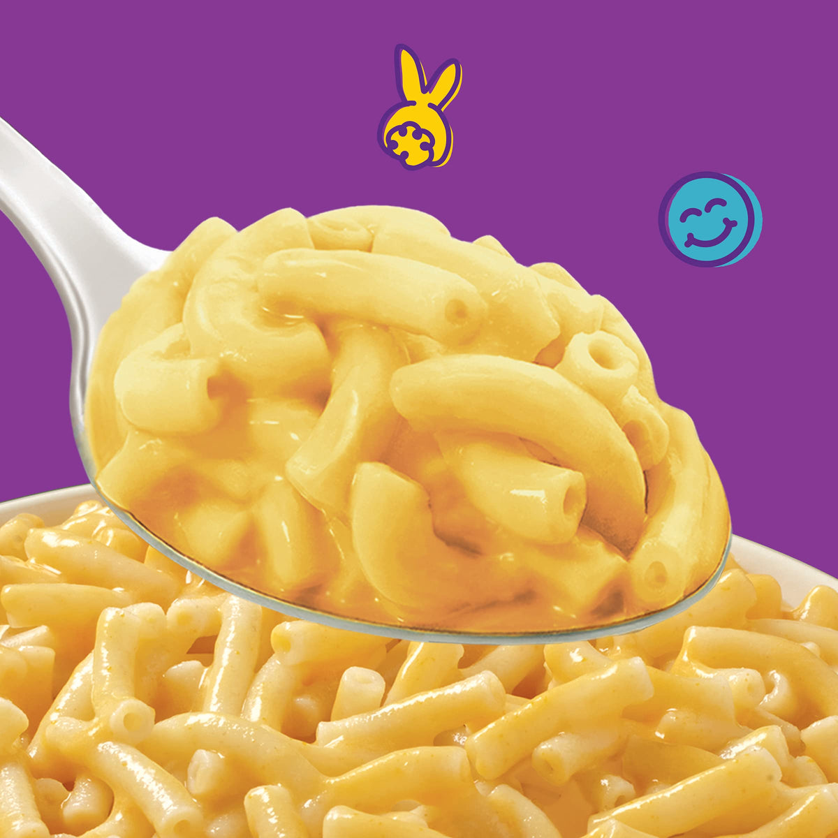 Annie's Real Aged Cheddar Mac Cup packaging stacked for pantry storage