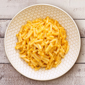 Organic Annie's pasta box highlighting plant-based ingredients for quick meals