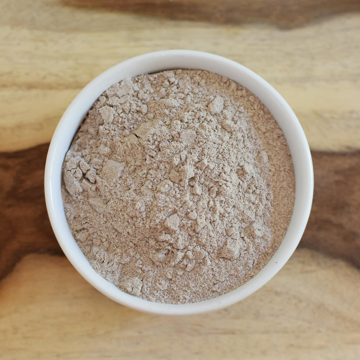 Porridge bowl featuring Anthony's Brown Teff Flour, gluten-free breakfast.