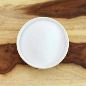 Anthony's Erythritol granules shown with keto-friendly ingredients for baking.