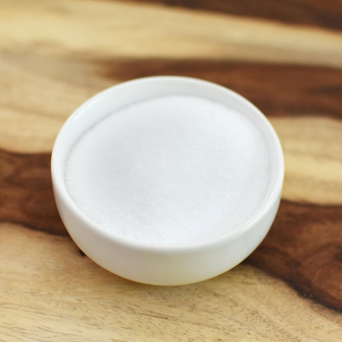 Anthony's erythritol granules dissolving in coffee or tea without clumping.