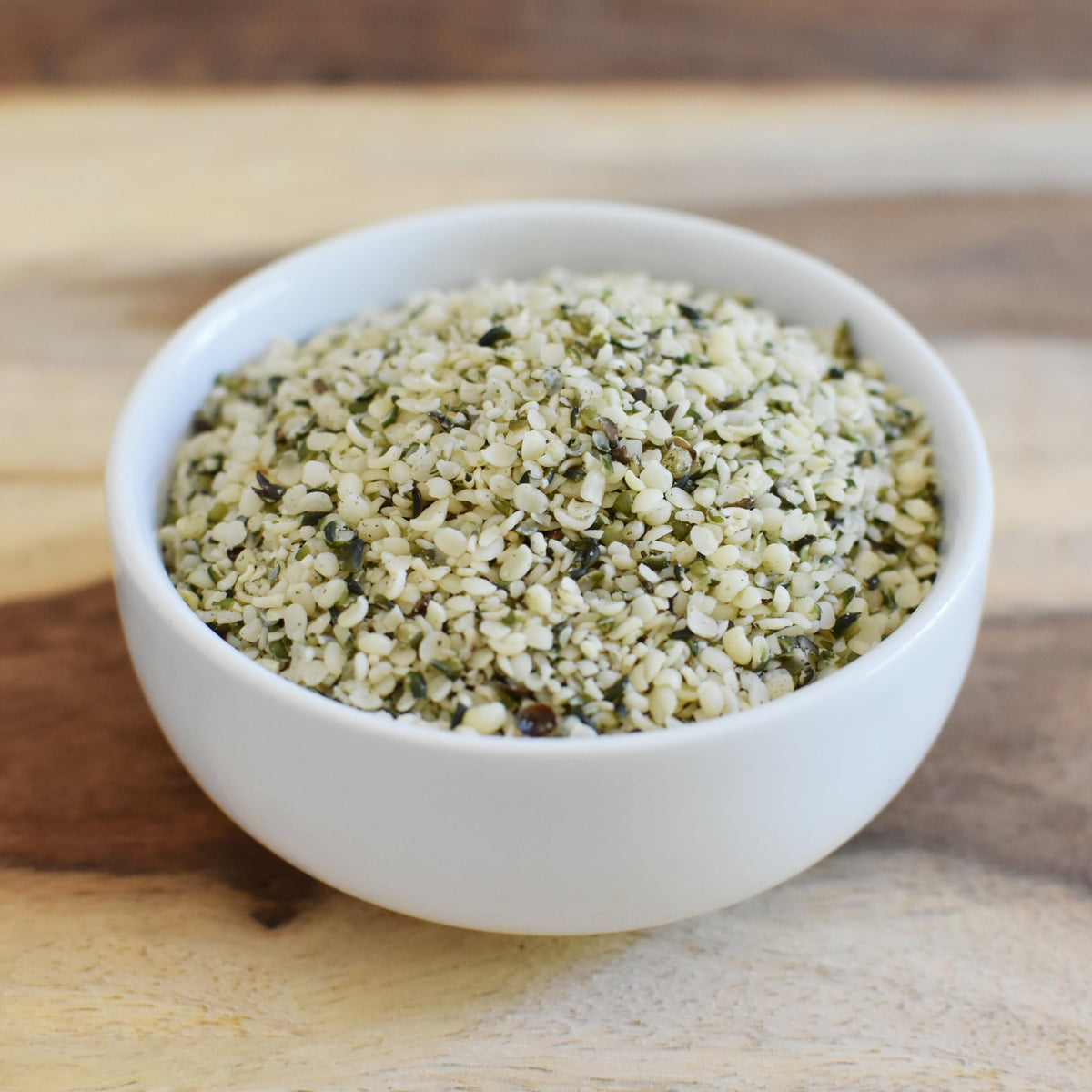 Anthony's hemp seeds stirred into oatmeal for a mild, versatile texture.