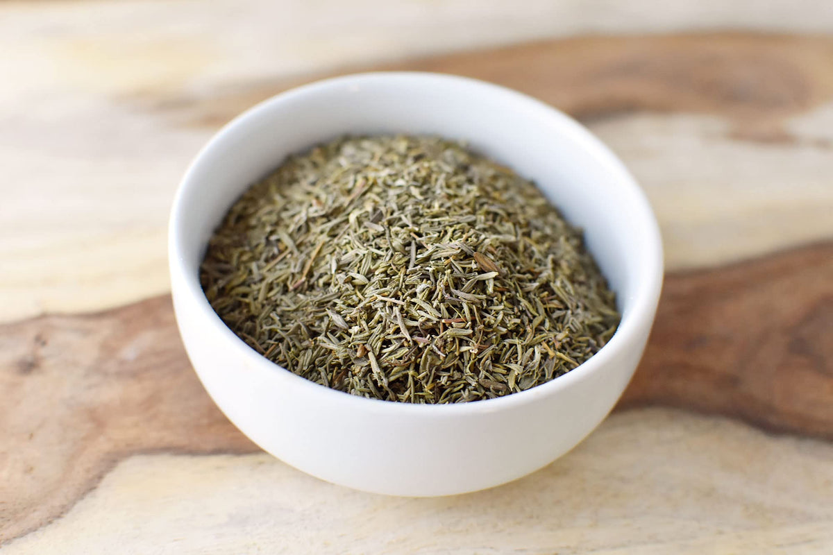 Anthony's Organic Dried Thyme Leaves with herbs layout—great base for custom spice blends.