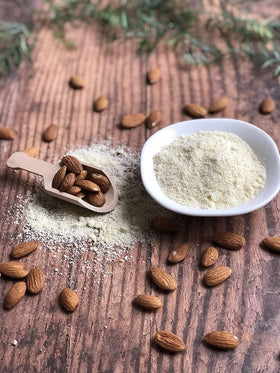 Pantry jar of Anthony's Blanched Almond Flour beside baking staples