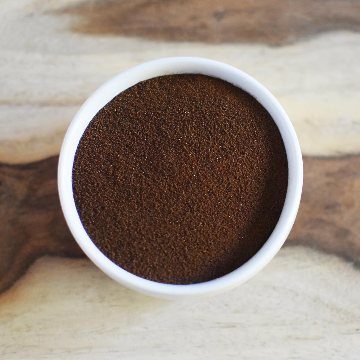 Anthony's Espresso Baking Powder closeup reveals micro-ground coffee beans for rich aroma and texture.