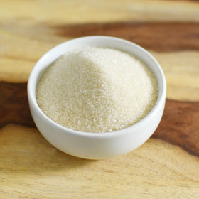 Anthony's Organic Cane Sugar pours into tea for natural sweetness.
