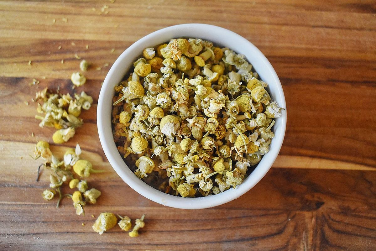 Anthony's Organic Chamomile Flowers in glass jar ideal for crafts and beauty products.