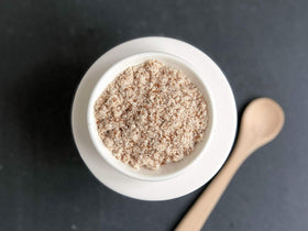 Anthony's Organic Coconut Creamer cup scene enhances coffee with smooth, dairy-free finish.