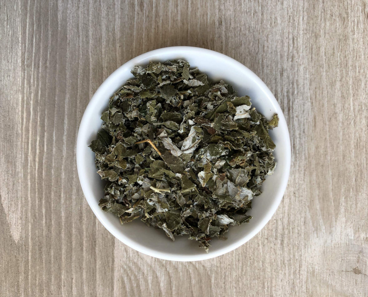 Brewed cup of Anthony's Organic Red Raspberry Leaves tea, inviting aroma.