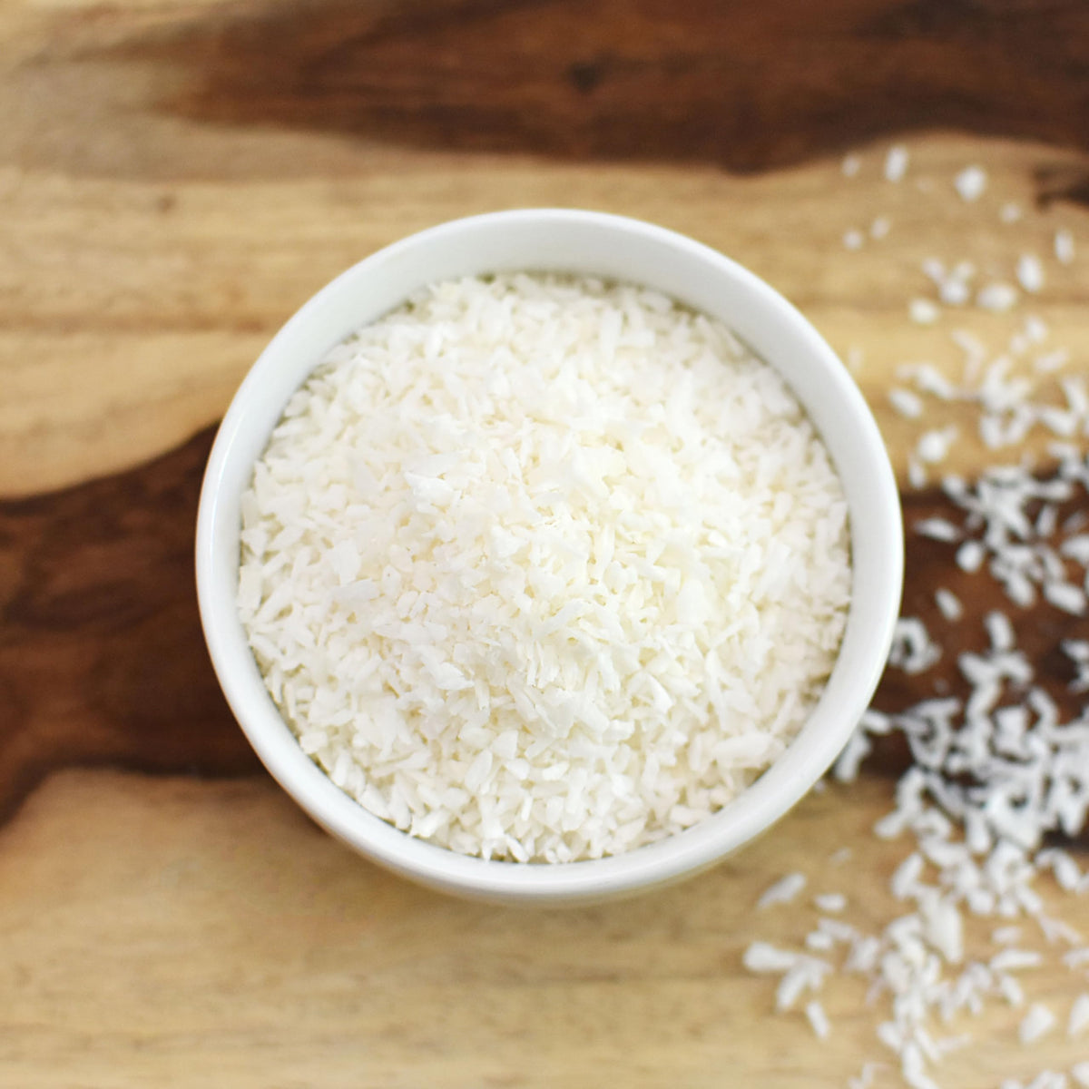 Anthony's Organic Shredded Coconut sprinkled over granola bowl for texture.