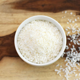 Anthony's Organic Shredded Coconut sprinkled over granola bowl for texture.