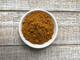 Anthony's turmeric powder added to a curry dish, delivering vibrant color and aroma