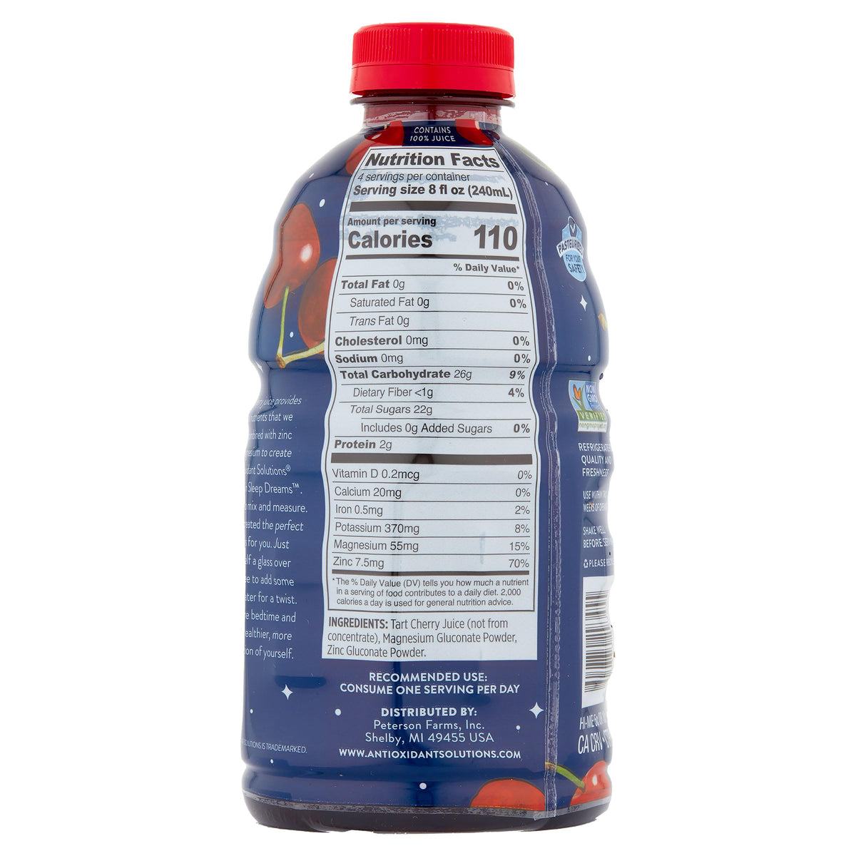 Sleep Dreams 32oz bottle on table for convenient at-home enjoyment.