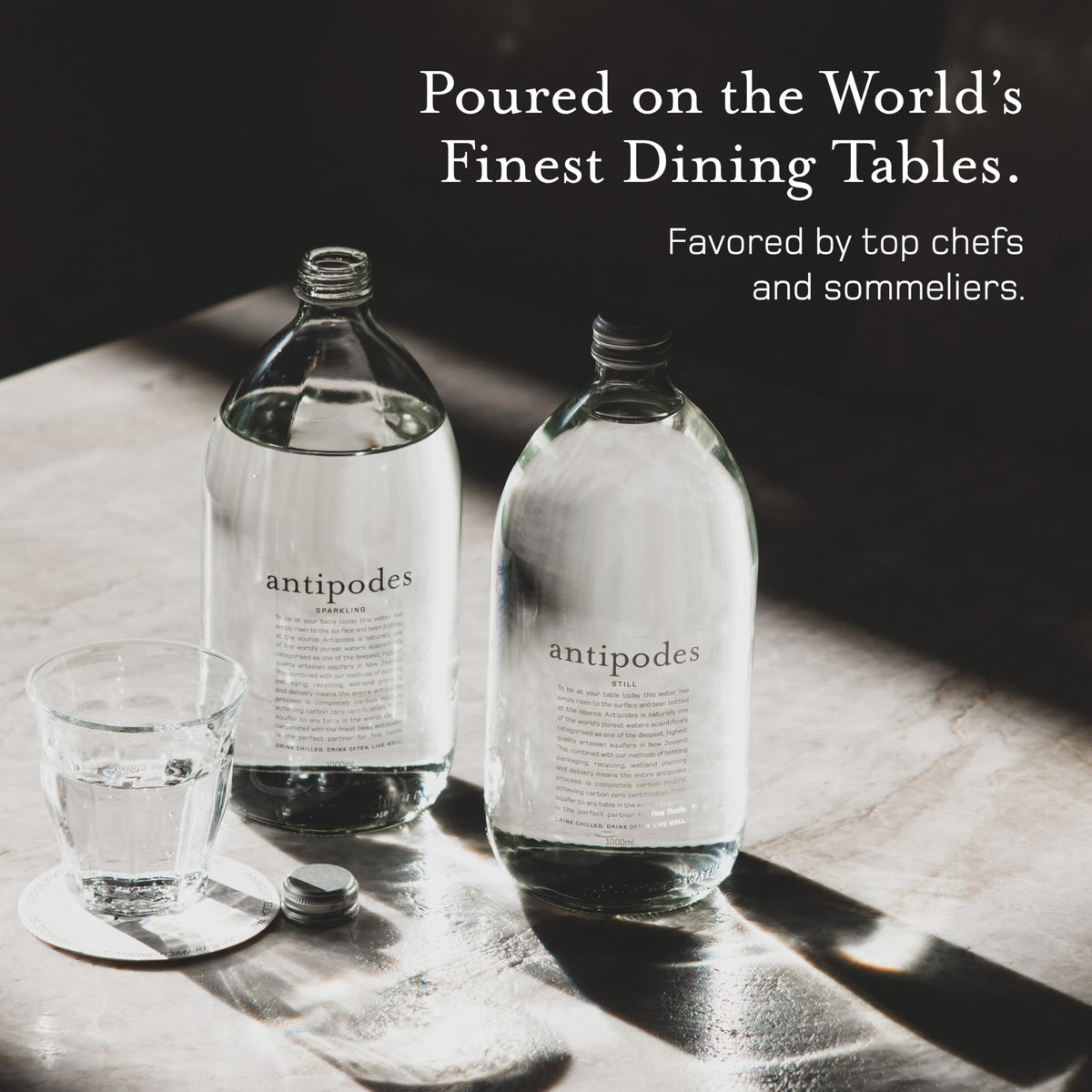 Antipodes water being poured, great for pairing with wine and meals.