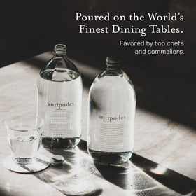 Antipodes water being poured, great for pairing with wine and meals.