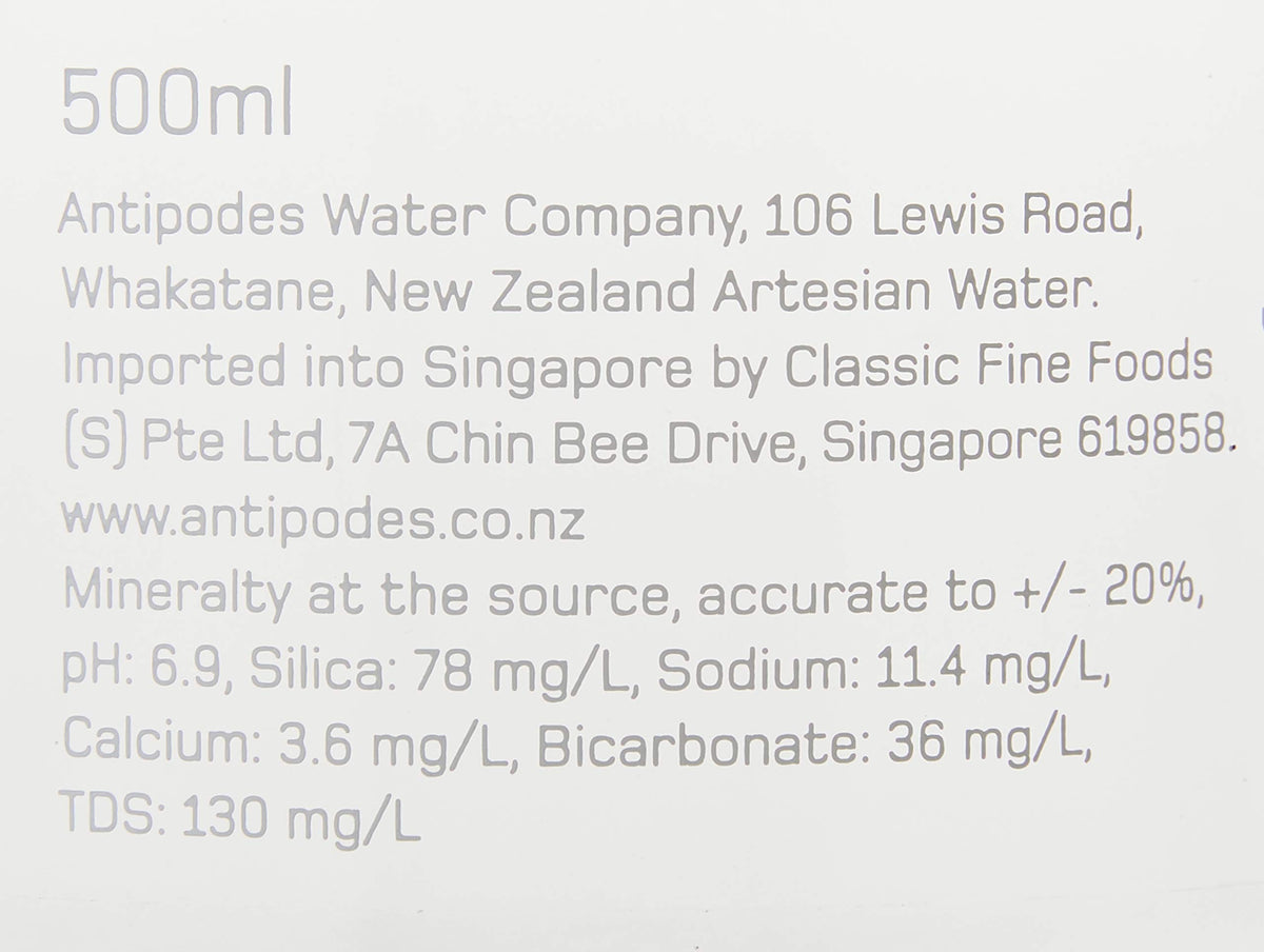 Antipodes water being poured at a fine dining setting, highlighting subtle minerality.