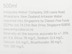 Antipodes water being poured at a fine dining setting, highlighting subtle minerality.