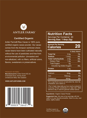 Antler Farms cacao powder scoop closeup highlights easy measuring for baking or smoothies.